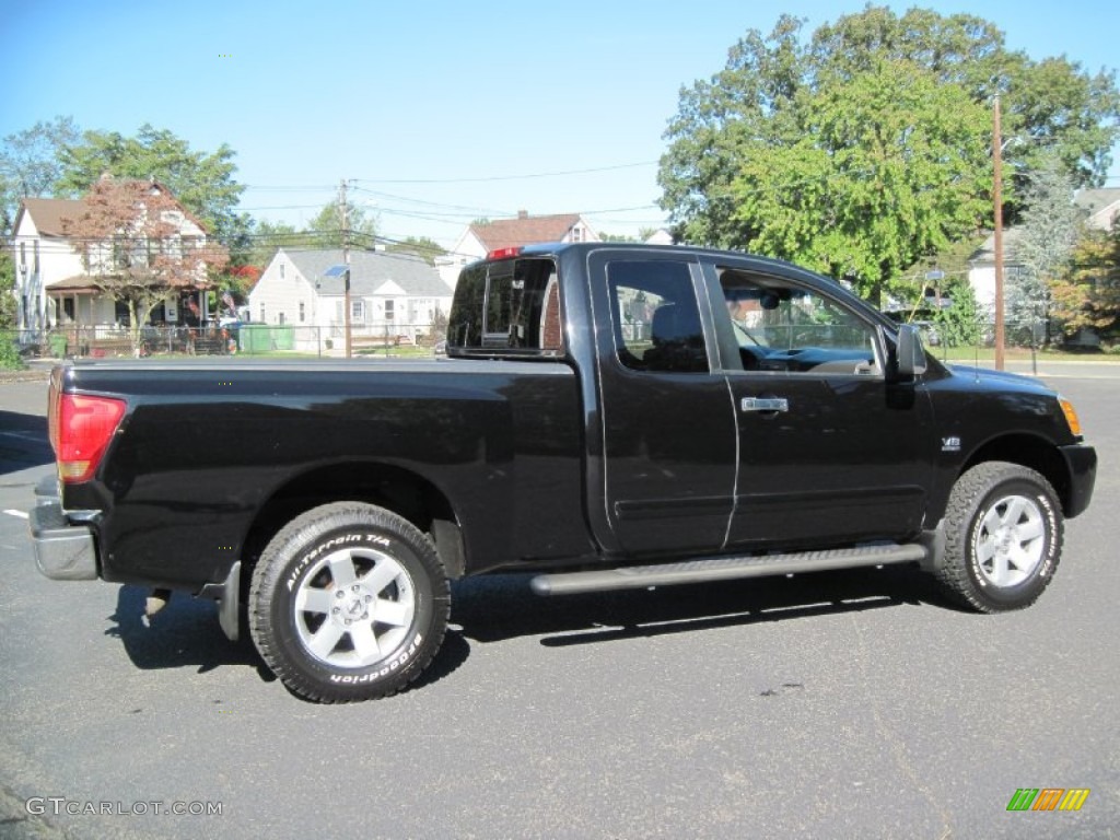 2004 Titan LE King Cab 4x4 - Galaxy Black / Graphite/Titanium photo #9