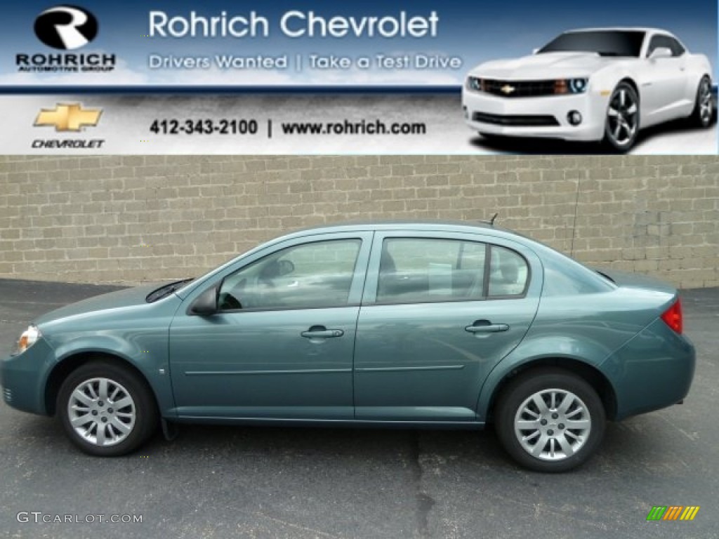 2009 Cobalt LS Sedan - Silver Moss Metallic / Gray photo #1