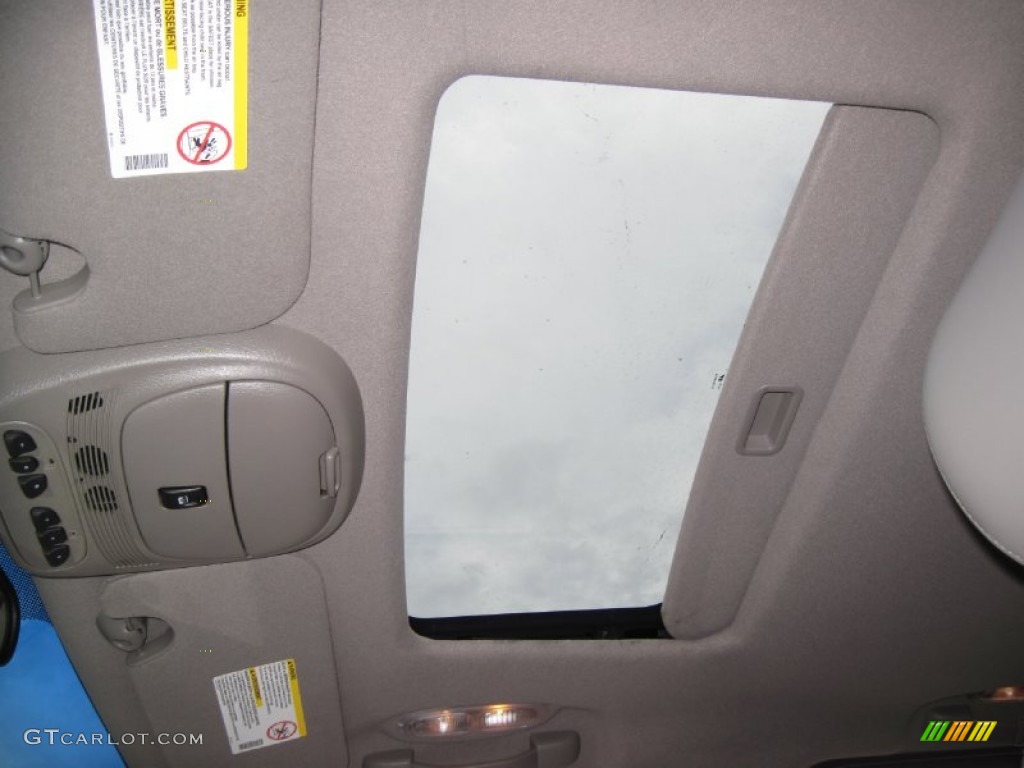 2004 Rainier CXL AWD - Black / Medium Pewter photo #19