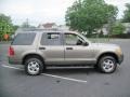 2004 Pueblo Gold Metallic Ford Explorer XLT 4x4  photo #9