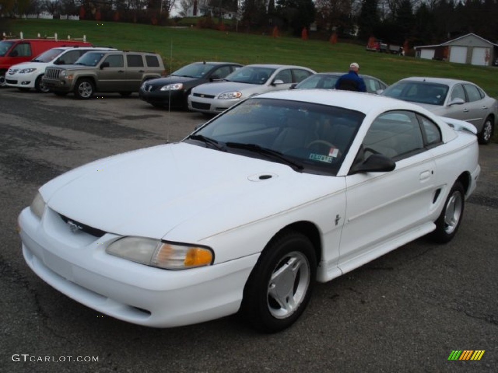 Crystal White 1997 Ford Mustang V6 Coupe Exterior Photo #56651328