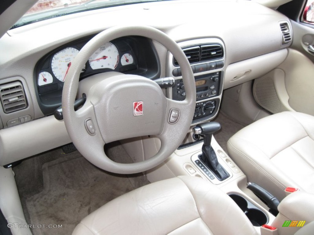 2005 L Series L300 Sedan - Berry Red / Tan photo #15