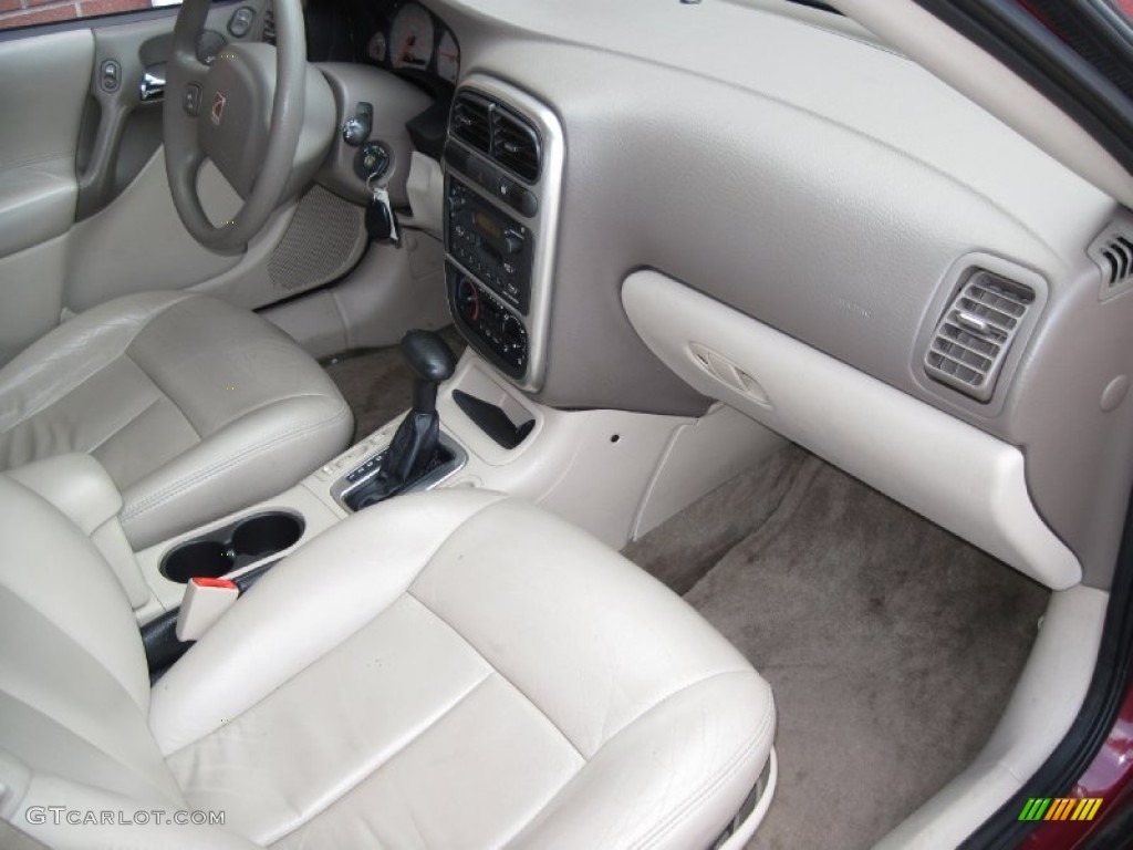 2005 L Series L300 Sedan - Berry Red / Tan photo #16