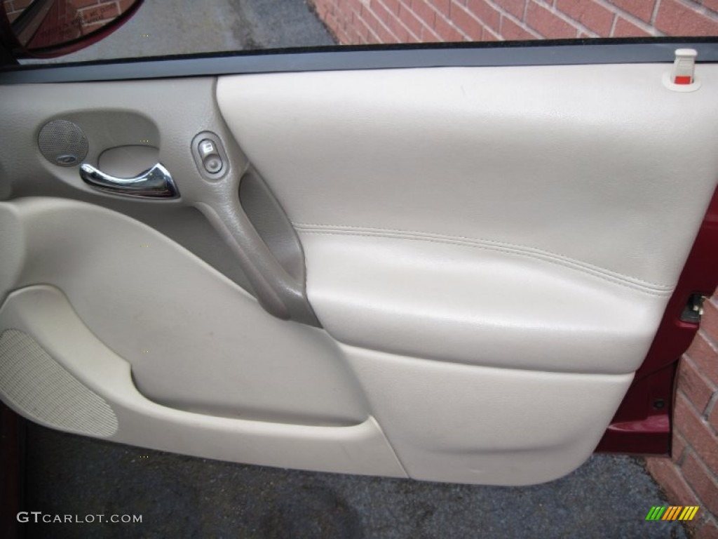 2005 L Series L300 Sedan - Berry Red / Tan photo #26