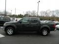 2010 Super Black Nissan Frontier SE Crew Cab 4x4  photo #2