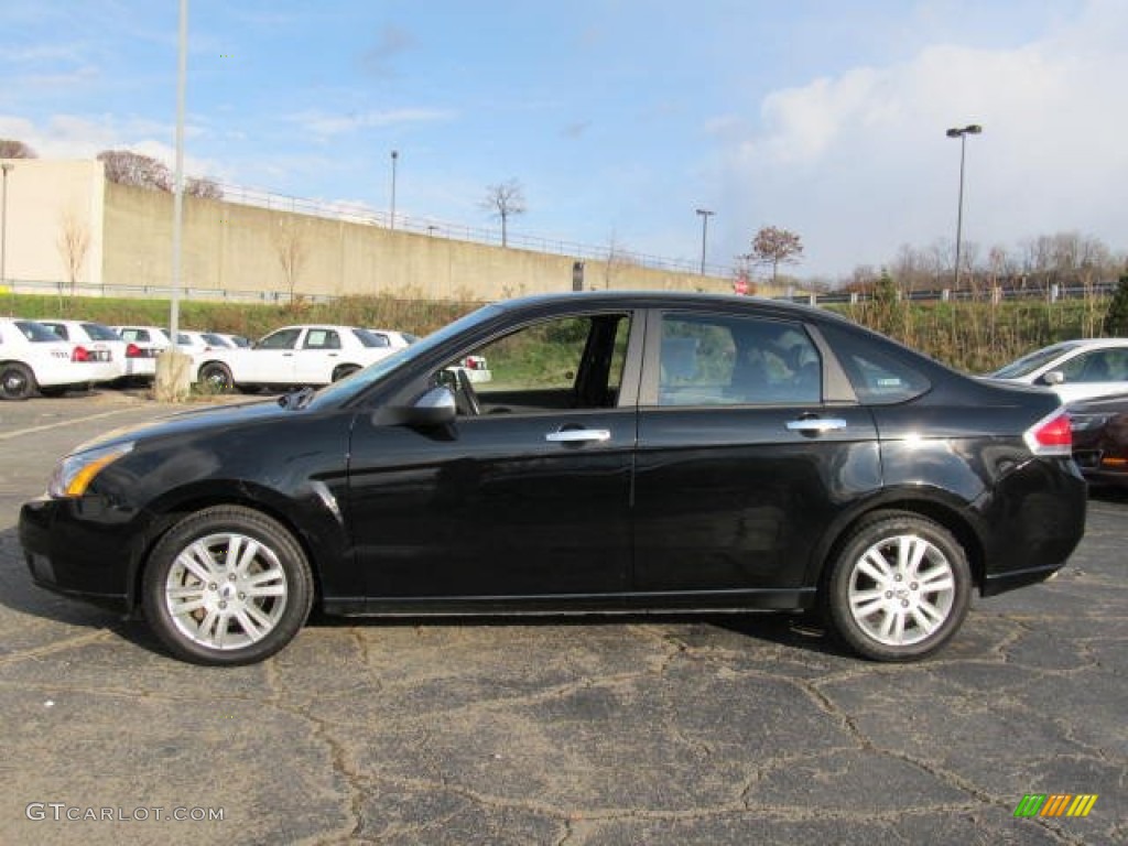 2011 Focus SEL Sedan - Ebony Black / Medium Stone photo #2