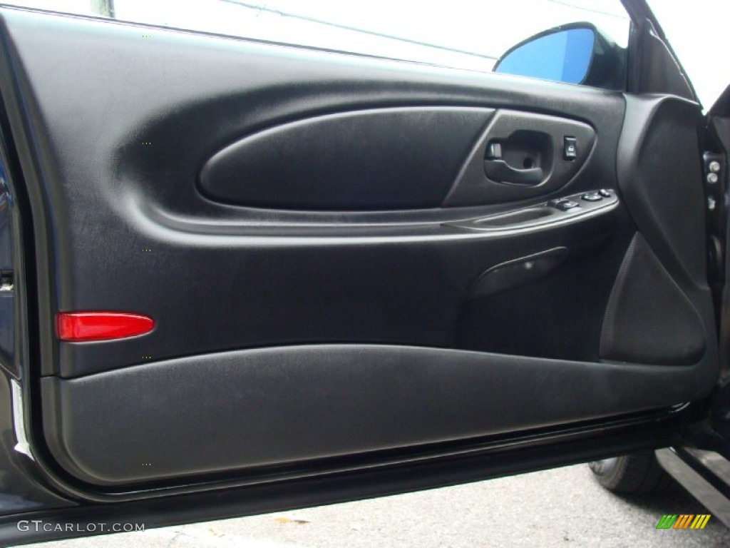 2005 Chevrolet Monte Carlo LT Ebony Door Panel Photo #56672820