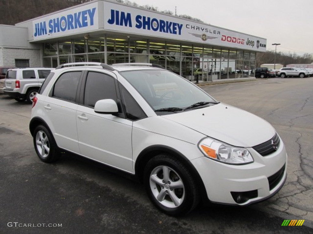 2009 SX4 Crossover Touring AWD - White Water Pearl / Black photo #1