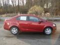 2012 Crystal Red Tintcoat Chevrolet Sonic LS Sedan  photo #1