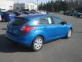 2012 Blue Candy Metallic Ford Focus SE 5-Door  photo #5