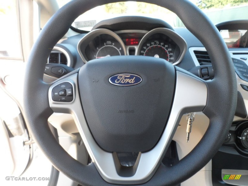 2012 Ford Fiesta SE Hatchback Light Stone/Charcoal Black Steering Wheel Photo #56745147