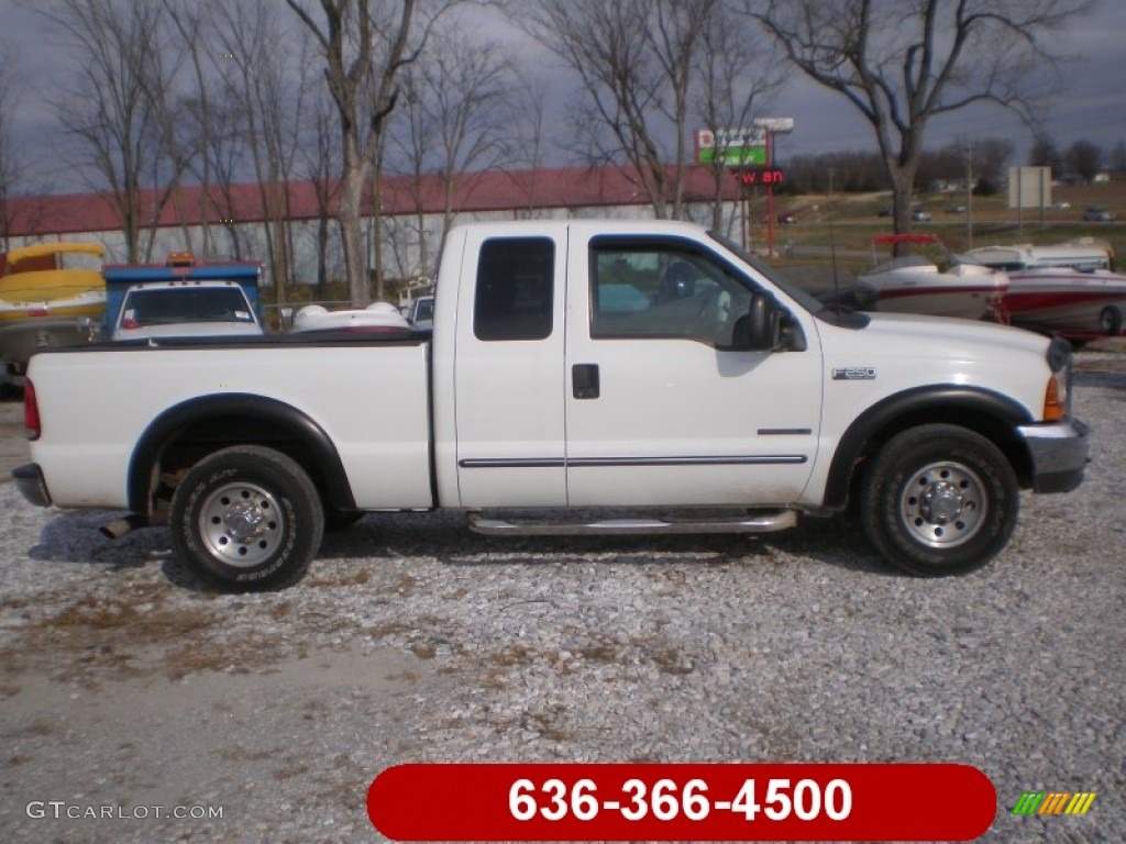 2000 F250 Super Duty XLT Extended Cab - Oxford White / Dark Denim Blue photo #1