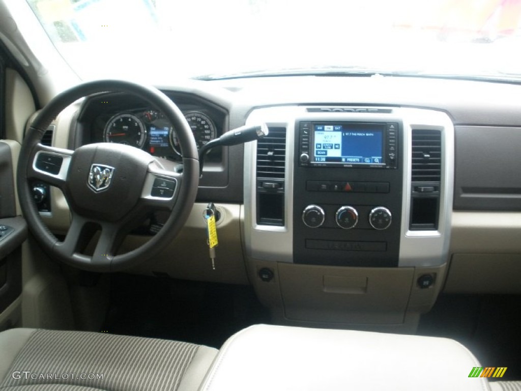 2011 Ram 1500 Big Horn Quad Cab - Saddle Brown Pearl / Light Pebble Beige/Bark Brown photo #8