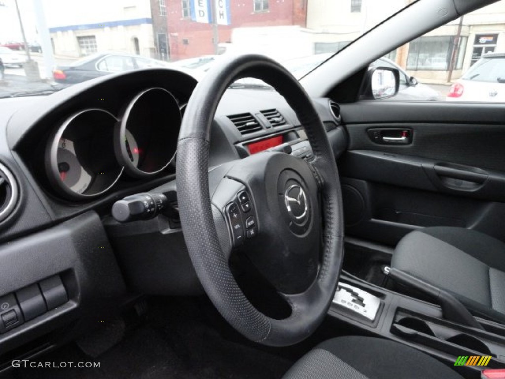 2009 Mazda MAZDA3 i Sport Sedan Black Steering Wheel Photo #56842649