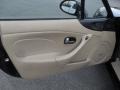 2003 Mazda MX-5 Miata Parchment Interior Door Panel Photo