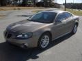 Bronzestone Metallic - Grand Prix GT Sedan Photo No. 1