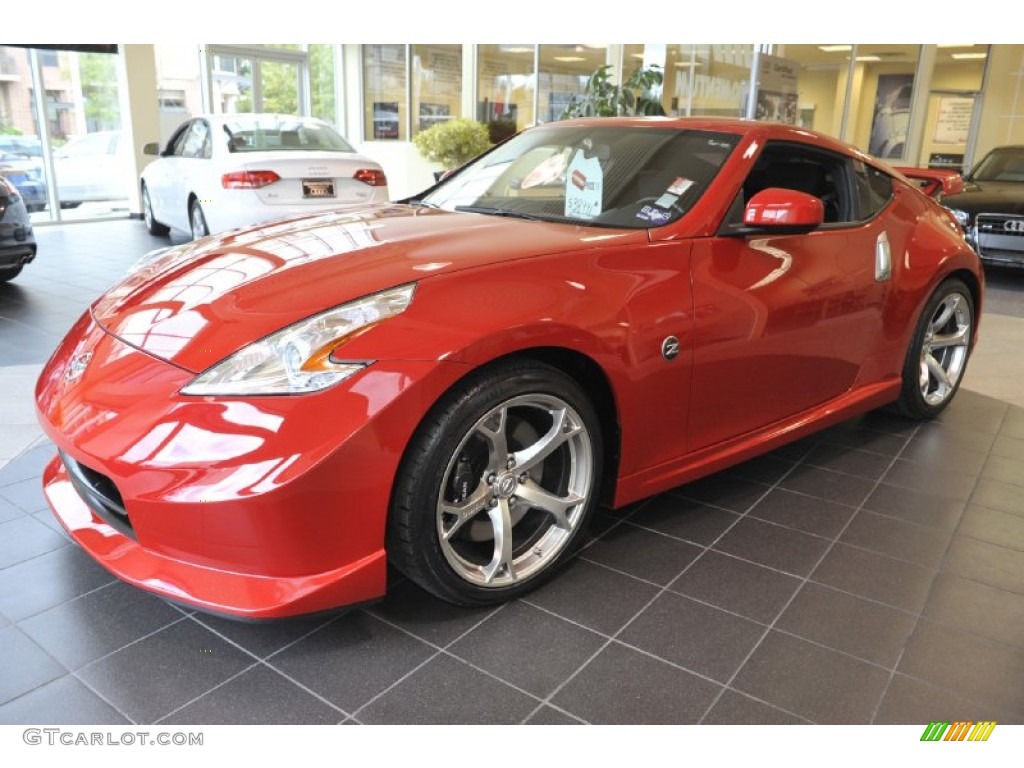 Solid Red 2011 Nissan 370Z NISMO Coupe Exterior Photo #56940359
