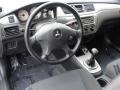 Black 2006 Mitsubishi Lancer OZ Rally Dashboard