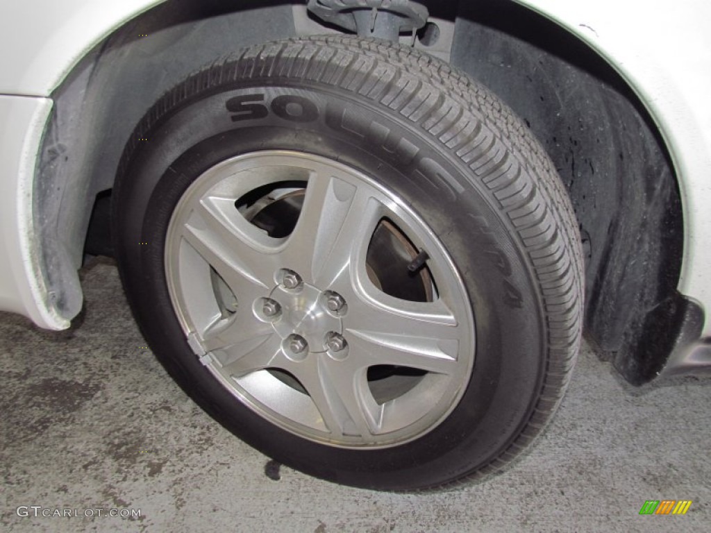 2002 Ford Taurus SEL Wheel Photo #57041768