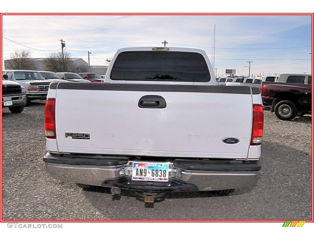 1999 F250 Super Duty XLT Extended Cab 4x4 - Oxford White / Medium Graphite photo #6