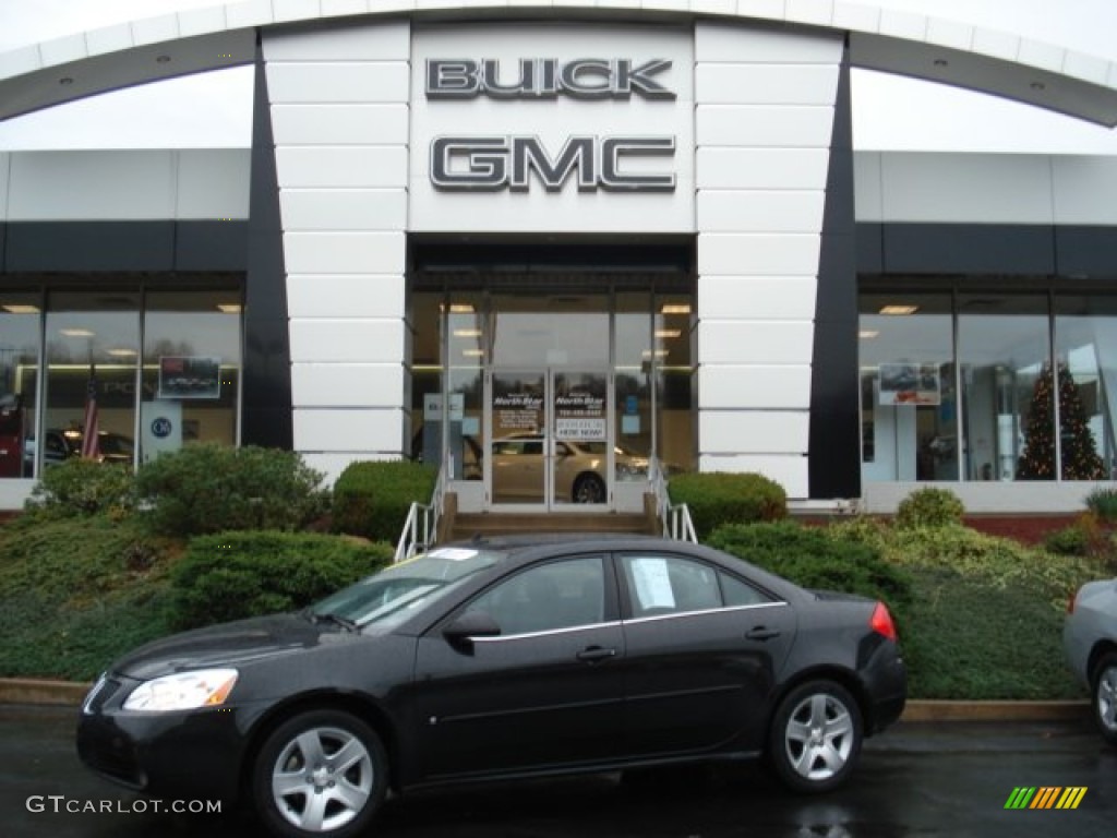 2009 G6 Sedan - Carbon Black Metallic / Ebony photo #1