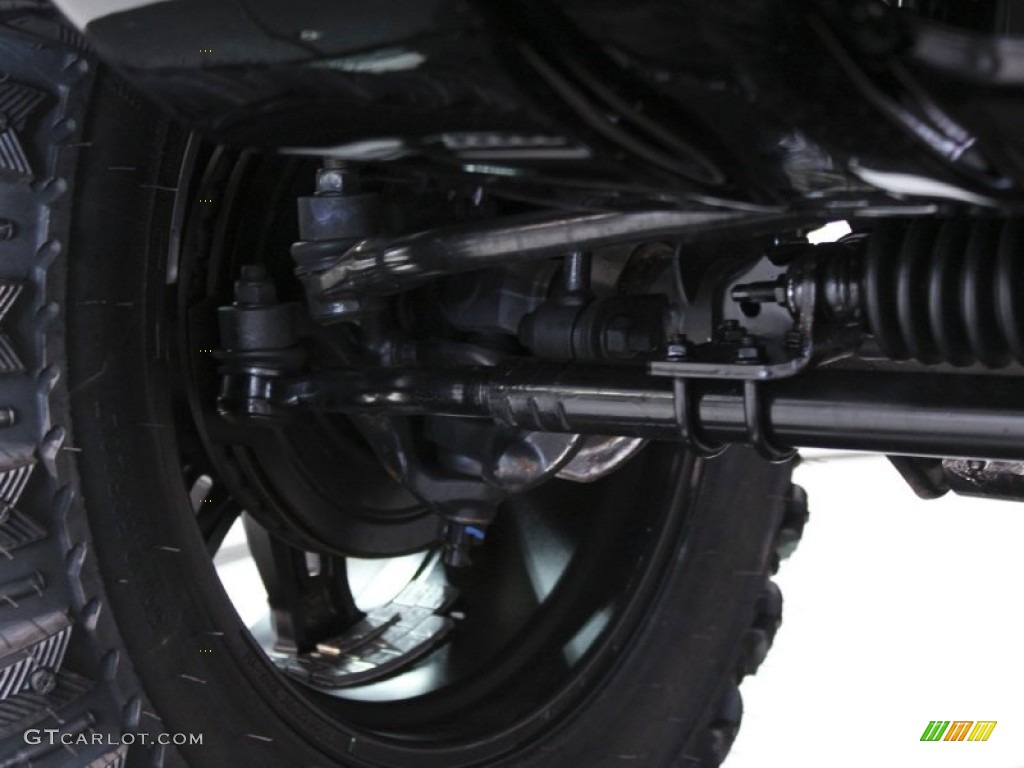 2011 Jeep Wrangler Unlimited Sahara 4x4 Undercarriage Photo #57127090