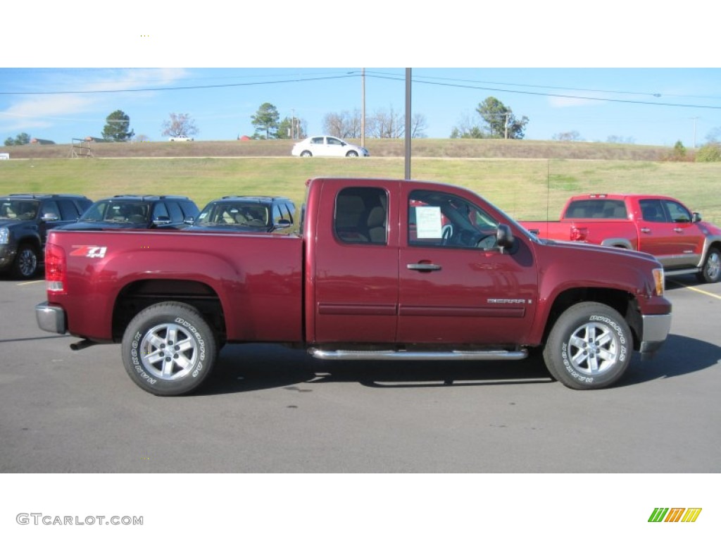 Dark Crimson Metallic 2009 GMC Sierra 1500 SLE Extended Cab 4x4 Exterior Photo #57137047