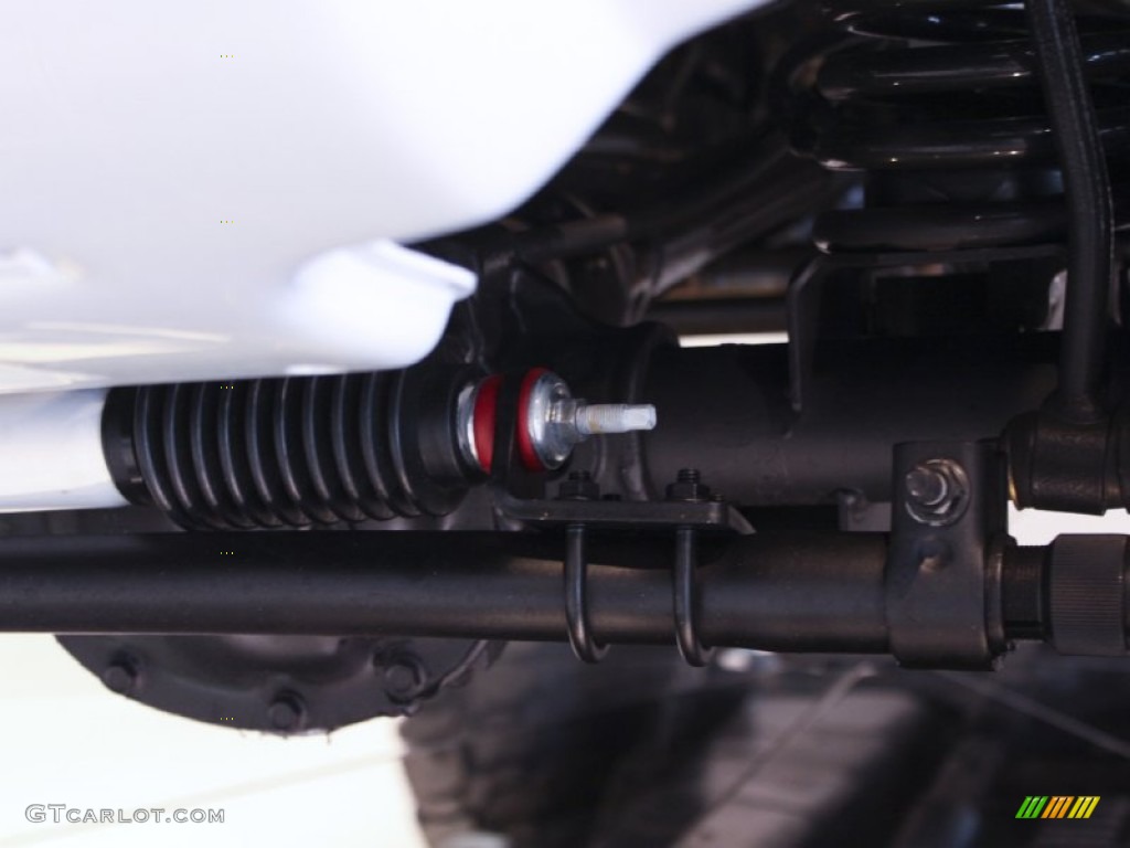 2011 Jeep Wrangler Unlimited Sahara 4x4 Undercarriage Photo #57139096