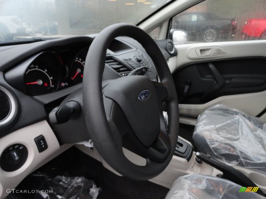 2012 Ford Fiesta S Sedan Light Stone/Charcoal Black Steering Wheel Photo #57144571