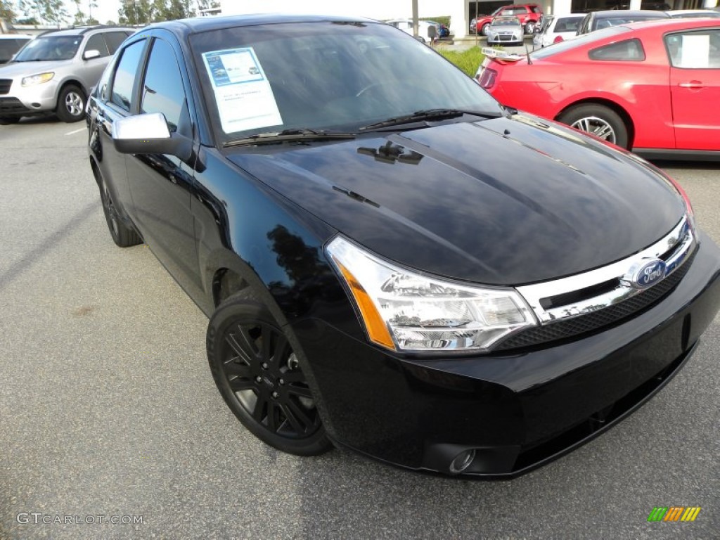 2011 Focus SEL Sedan - Ebony Black / Charcoal Black photo #1