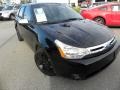 2011 Ebony Black Ford Focus SEL Sedan  photo #1