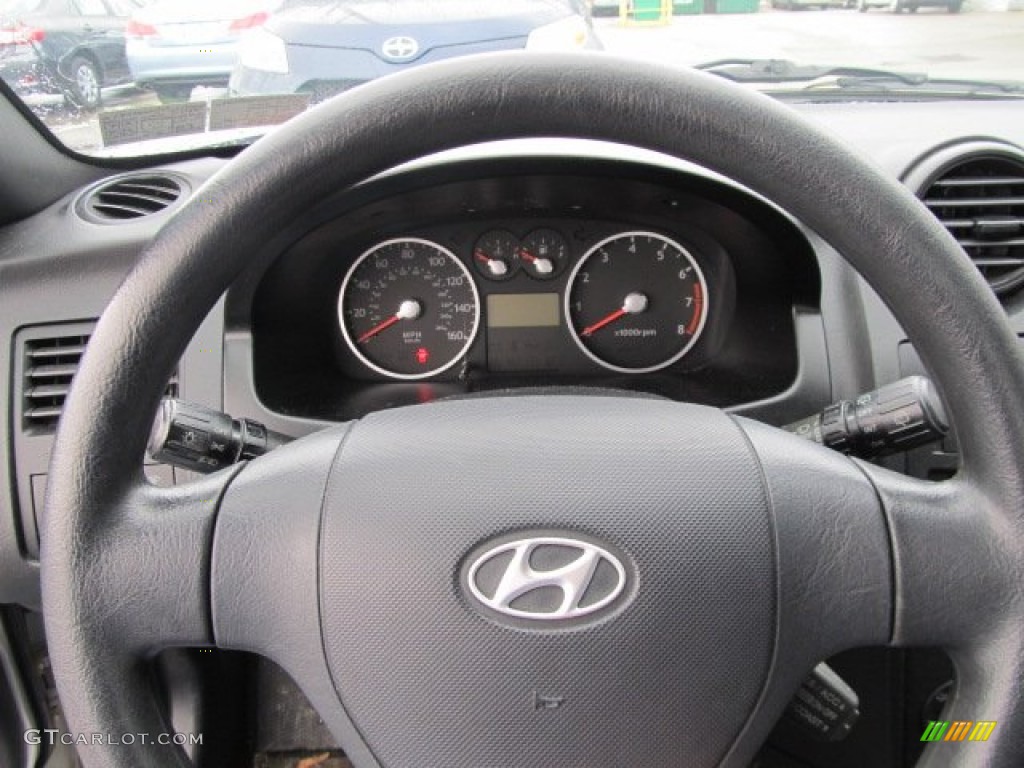 2003 Hyundai Tiburon Standard Tiburon Model Black Steering Wheel Photo #57207379