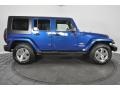 2009 Deep Water Blue Pearl Jeep Wrangler Unlimited Sahara 4x4  photo #6