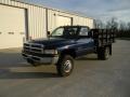 2002 Patriot Blue Metallic Dodge Ram 3500 SLT Regular Cab Dually Stake Truck  photo #4