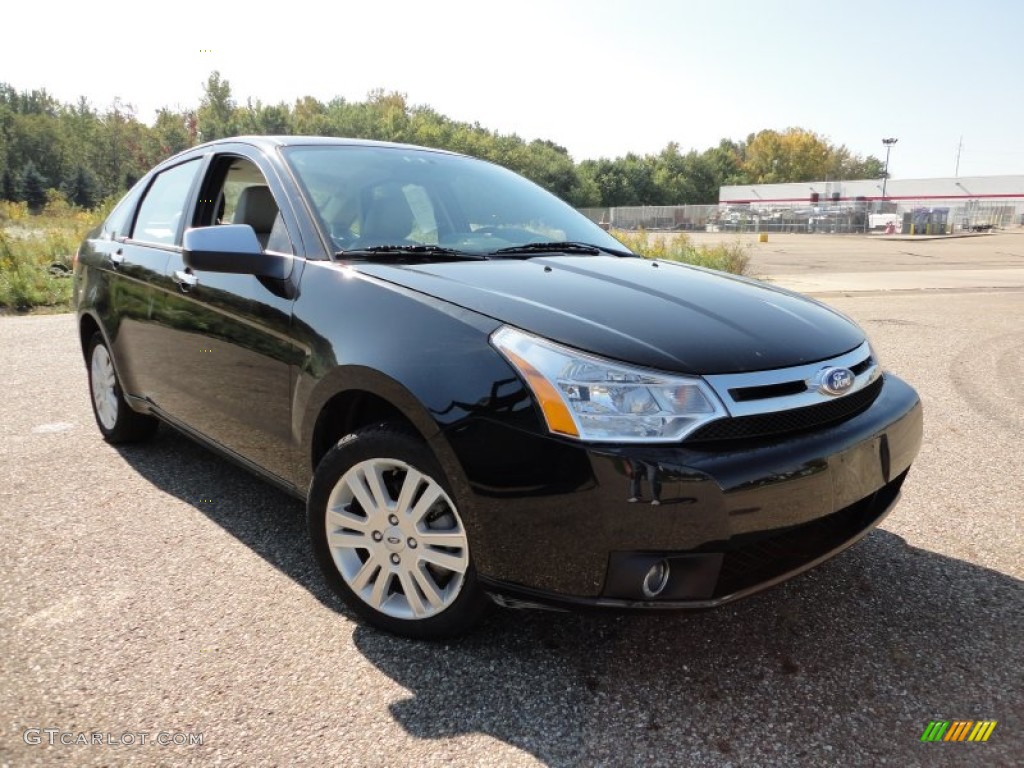 2011 Focus SEL Sedan - Ebony Black / Medium Stone photo #1