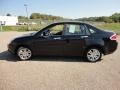 2011 Ebony Black Ford Focus SEL Sedan  photo #15