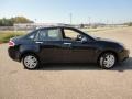 2011 Ebony Black Ford Focus SEL Sedan  photo #16