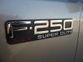 2004 Ford F250 Super Duty XLT SuperCab 4x4 Badge and Logo Photo