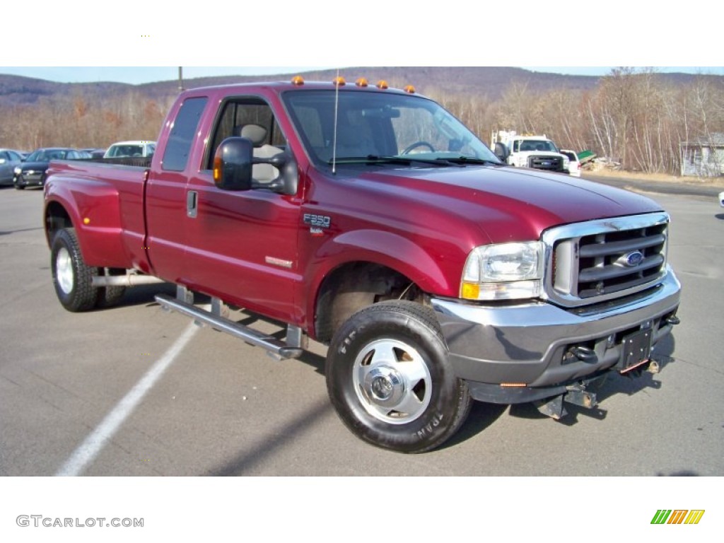 Dark Toreador Red Metallic 2004 Ford F350 Super Duty XLT SuperCab 4x4 Dually Exterior Photo #57369099