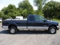 2004 True Blue Metallic Ford F250 Super Duty XLT SuperCab 4x4  photo #33