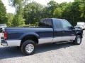 2004 True Blue Metallic Ford F250 Super Duty XLT SuperCab 4x4  photo #34