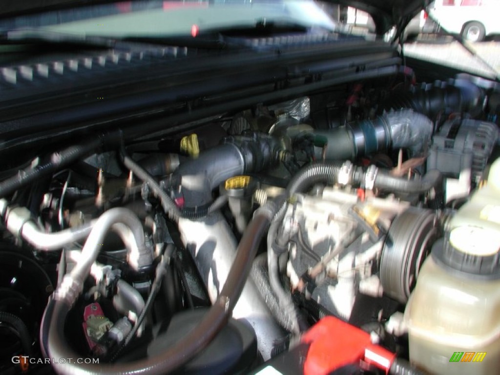 2003 F350 Super Duty Lariat SuperCab 4x4 - Dark Highland Green Metallic / Medium Parchment photo #28