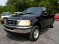 Black 1999 Ford F150 XL Extended Cab 4x4