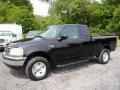 1999 Black Ford F150 XL Extended Cab 4x4  photo #2