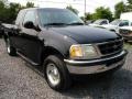 1999 Black Ford F150 XL Extended Cab 4x4  photo #7