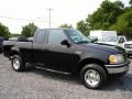 1999 Black Ford F150 XL Extended Cab 4x4  photo #8