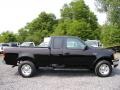 1999 Black Ford F150 XL Extended Cab 4x4  photo #9