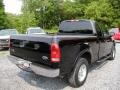 1999 Black Ford F150 XL Extended Cab 4x4  photo #11