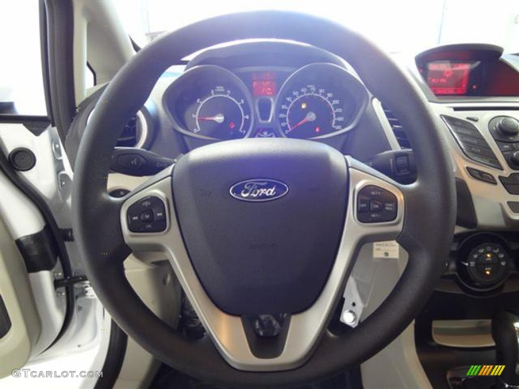 2012 Ford Fiesta SE Sedan Light Stone/Charcoal Black Steering Wheel Photo #57402671