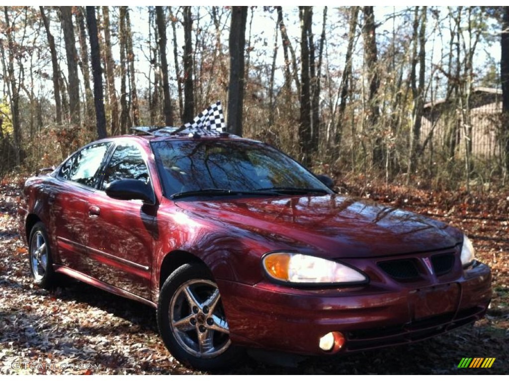 2003 Grand Am SE Sedan - Redfire Metallic / Dark Pewter photo #1